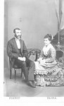 Portrait of an unidentified man and woman, seated.