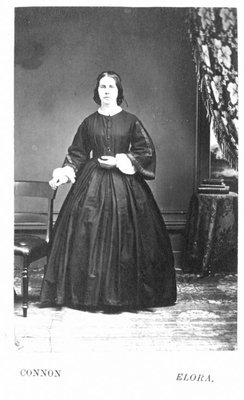 Portrait of an unidentified woman, standing.