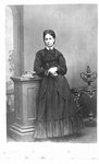 Portrait of an unidentified woman, standing.