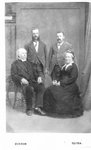 Group portrait of one woman and three men.