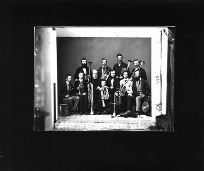 Group portrait of a brass band.