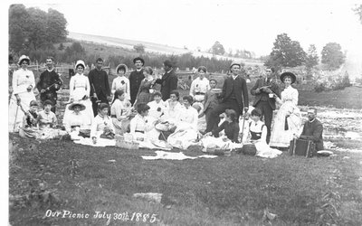 Portrait of an unidentified group of people on a picnic, July 30th, 1885.