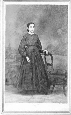 Full length portrait of a young woman.