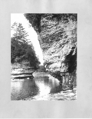 Elora Gorge with  Robert Laidlaw Shortreed fishing along the river bank.