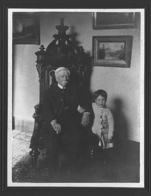 Portrait of Lt. Col. Charles Clarke, with a young child.