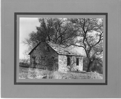 Dilapidated stone cottage.