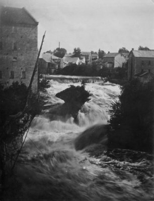 The Grand River, showing the Falls, the "Tooth of Time" and a portion of the mill, Elora, Ontario.