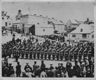 First Elora Rifle Company photographed at the foot of Main St., Elora, Captain D.M. Potter Commanding Officer.