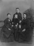 Group family portrait, likely four generations, with Mrs. Thomas Connon on the left.