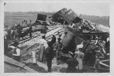 View of a freight train wreck; on one car is Grand Trunk 21132.