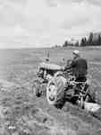 Ploughing [Plowing] a Field