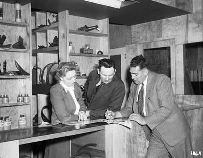 Unidentified People in a Farm Equipment Dealership, Ottawa, ON