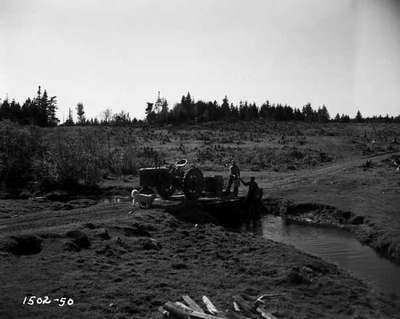 Men Loading Water