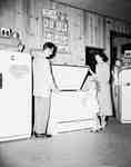 Robert Grey, Bernice Hurst and Diane Lynn Looking at Showroom Freezer, Burlington, ON