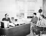 Men Being Interviewed in an Office