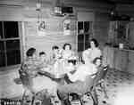Family Eating at a Kitchen Table