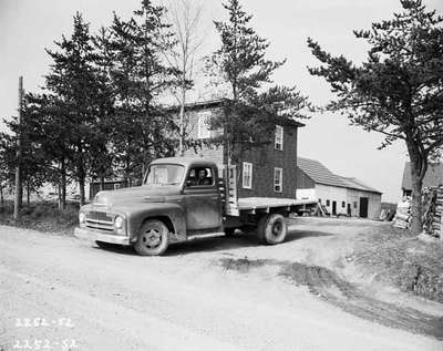 Truck Pulling onto Dirt Road