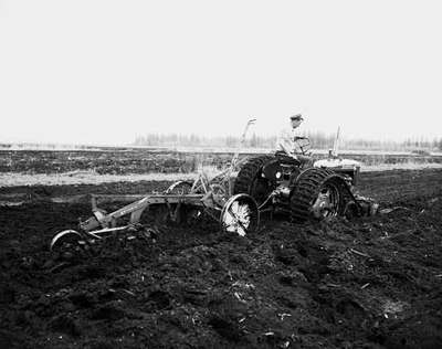 Ploughing [Plowing] a Field