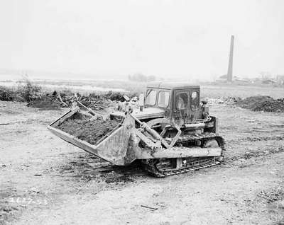 Crawler Tractor Shoveling, Kingston, ON