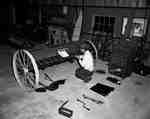 Unidentified Man Assembling a Seed Drill, St. Agatha, ON