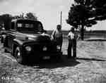 Unidentified Men Talking Beside a Truck, Curran, ON