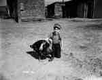 Young Boy Posing With a Turkey, Curran, ON