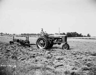 Ploughing [Plowing] a Field