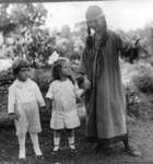 Photograph of children Elizabeth and Robert Brown with Helen Mann