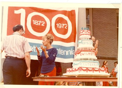 People with Centennial cake