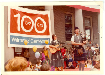 Piper and Gerry Armstrong performing