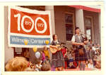 Piper and Gerry Armstrong performing