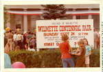 Children standing in front of a sign announcing the Wilmette Centennial Fair on September 24