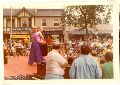 Performers on a stage in the street