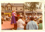 Performers on a stage in the street