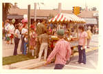 People and a refreshment wagon