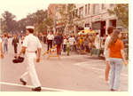 Sailor walking across the street