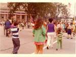 People crossing the street in front of Wilmette Village Hall