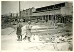 Two women workers at an industrial site